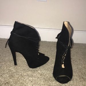 Heeled open toe black booties
